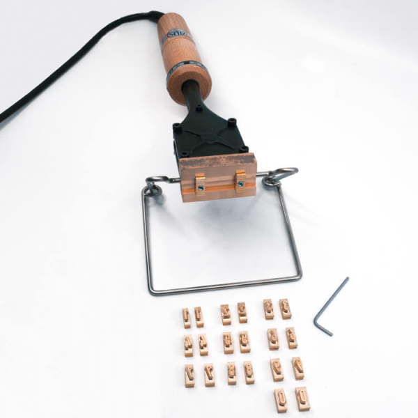 Brännstämpel för serienummer