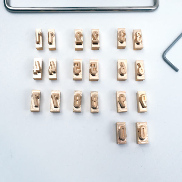 Brännstämpel för serienummer