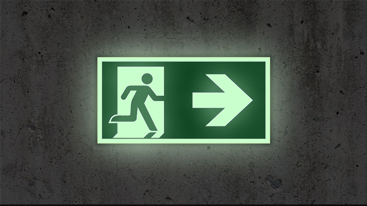 Upplysta skyltar för utrymningsvägar